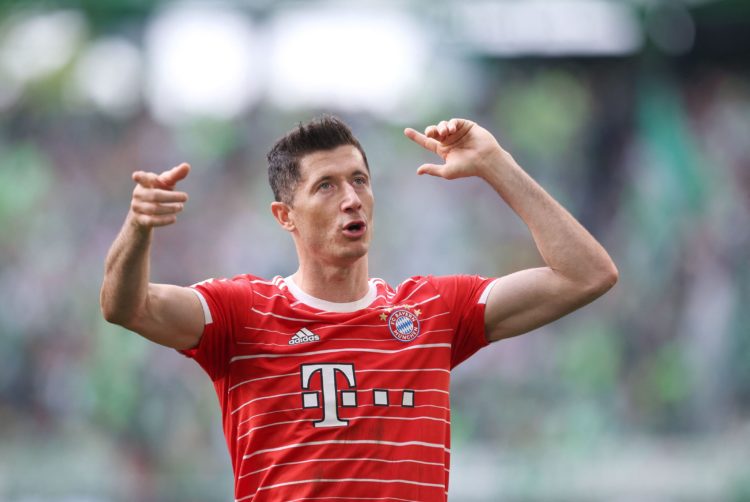 Bayern Munich's Polish forward Robert Lewandowski reacts after the German first division Bundesliga football match VfL Wolfsburg v Bayern Munich in Wolfsburg, northern Germany, on May 14, 2022. - DFL REGULATIONS PROHIBIT ANY USE OF PHOTOGRAPHS AS IMAGE SEQUENCES AND/OR QUASI-VIDEO (Photo by RONNY HARTMANN / AFP) / DFL REGULATIONS PROHIBIT ANY USE OF PHOTOGRAPHS AS IMAGE SEQUENCES AND/OR QUASI-VIDEO (Photo by RONNY HARTMANN/AFP via Getty Images)