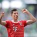 Bayern Munich's Polish forward Robert Lewandowski reacts after the German first division Bundesliga football match VfL Wolfsburg v Bayern Munich in Wolfsburg, northern Germany, on May 14, 2022. - DFL REGULATIONS PROHIBIT ANY USE OF PHOTOGRAPHS AS IMAGE SEQUENCES AND/OR QUASI-VIDEO (Photo by RONNY HARTMANN / AFP) / DFL REGULATIONS PROHIBIT ANY USE OF PHOTOGRAPHS AS IMAGE SEQUENCES AND/OR QUASI-VIDEO (Photo by RONNY HARTMANN/AFP via Getty Images)