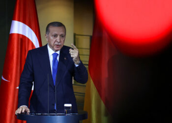 FILE PHOTO: Turkish President Tayyip Erdogan gestures as he attends a press conference with German Chancellor Olaf Scholz (not pictured) at the Chancellery in Berlin, Germany, November 17, 2023. REUTERS/Liesa Johannssen/File Photo