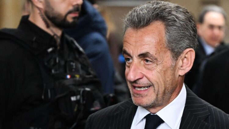 France's former president Nicolas Sarkozy arrives for the verdict in his appeal trial in the so-called Bygmalion case, at the courthouse, in Paris, on February 14, 2024. A Paris court will on February 14, 2024 issue its verdict in a case involving former French president Nicolas Sarkozy who is appealing a one-year jail sentence for illegal campaign financing. (Photo by Bertrand GUAY / AFP)