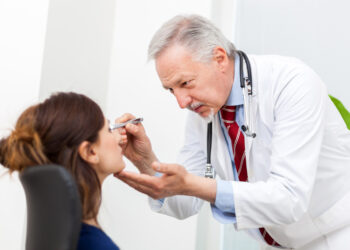 Doctor visiting a patient's eyes