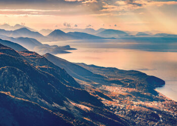 Aerial summer scene of Adriatic coast of Albania. Fantastic morning view from Llogara pass, Albania, Europe. Beauty of nature concept background.