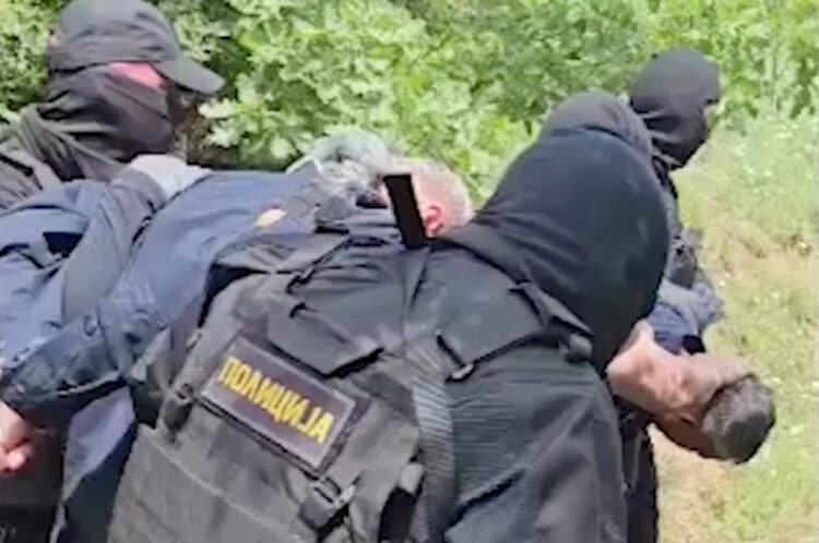 Serbian security forces detain Kosovo police officers in a location given as near Gnjilica, Serbia June 14, 2023 in this screengrab obtained from a handout video. MINISTRY OF INTERNAL AFFAIRS OF SERBIA/via REUTERS  THIS IMAGE HAS BEEN SUPPLIED BY A THIRD PARTY. MANDATORY CREDIT. NO RESALES. NO ARCHIVES. REUTERS WAS NOT ABLE TO INDEPENDENTLY VERIFY THE LOCATION OF THE VIDEO