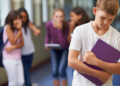 A young boy being bullied at school